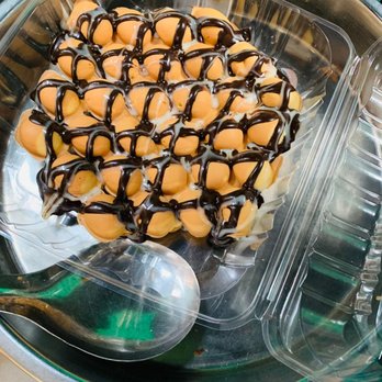Hong Kong Cakes - a dessert in a plastic container - Food Stands Near Me - New York, New York