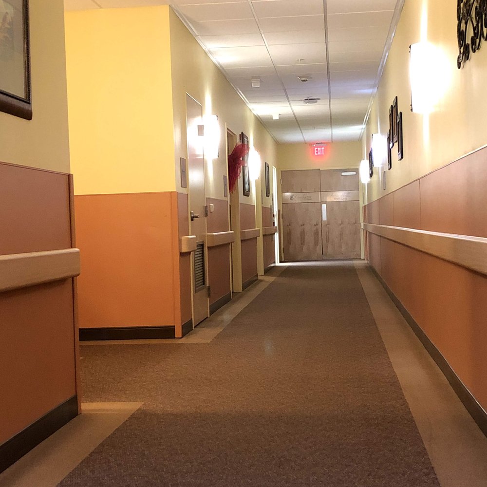 Loyalhanna Care Center - Looking down hallway from elevators on floor 1 of Loyalhanna Senior Suites & Personal Care - Skilled Nursing Near Me - Latrobe, Pennsylvania