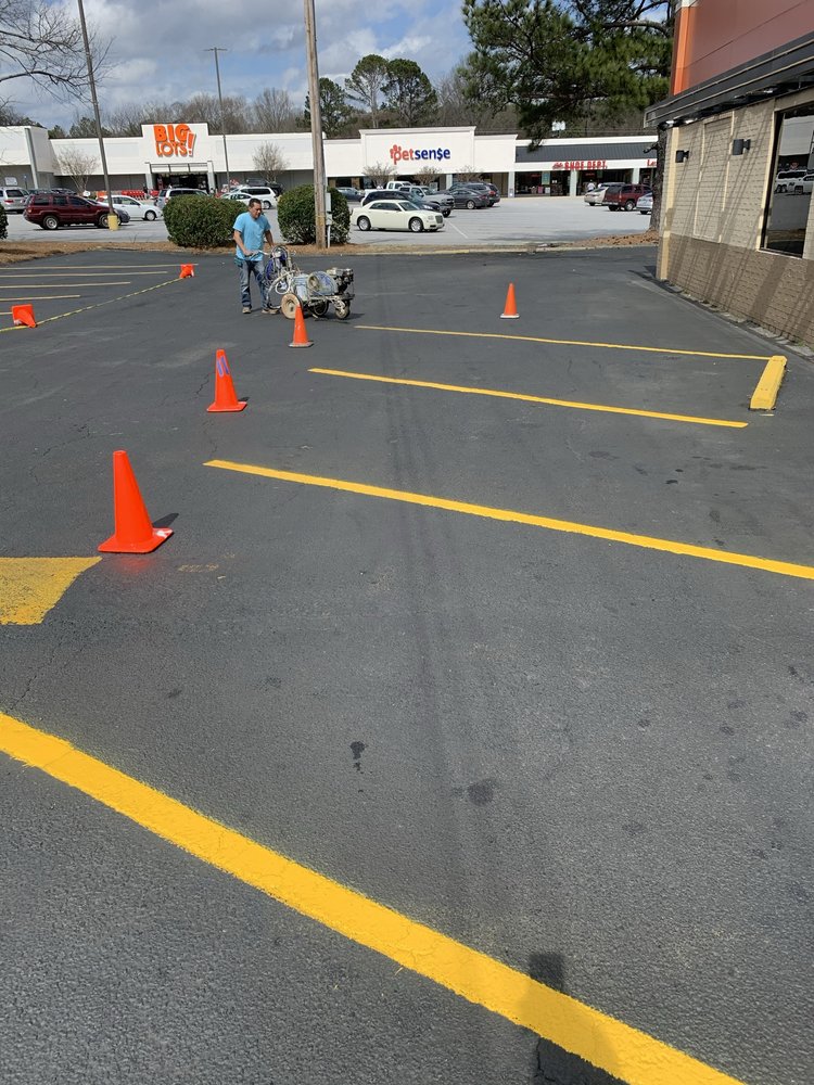 Slide of A1 Seal Coating and Roofing