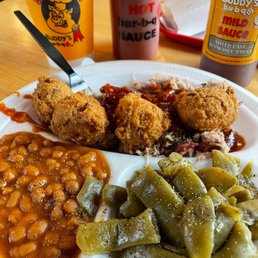 Pulled pork, hush puppies, Baked Beans, Green Beans Pulled pork, hush puppies, Baked Beans, Green Beans