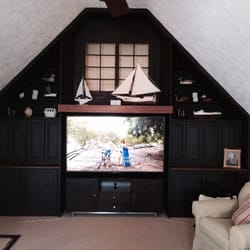 Schneider Home Theater - 70" sony mounted above an equipment stand took the place of an old rear projection TV