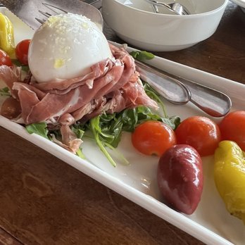 Macaluso's Italian Restaurant - PROSCUITTO CON BURRATA - Italian Near Me - Ruston, Washington Macaluso's Italian Restaurant - PROSCUITTO CON BURRATA - Italian Near Me - Ruston, Washington