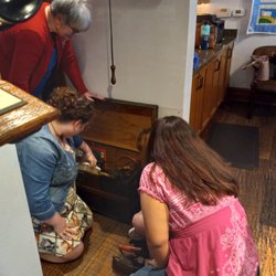 Roanoke Visitor Center and Museum - Museum Staff Engaging with the Children