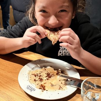 Time Out Market - Enjoying the Nutella calzone - French Near Me - Montreal, Quebec Time Out Market - Enjoying the Nutella calzone - French Near Me - Montreal, Quebec