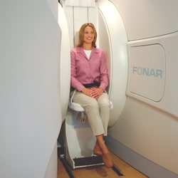 SUMA MRI - SUMA MRI patient sitting for an open upright MRI scan.