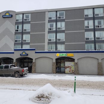 Cora - The little Cora's sign on the Days Inn Hotel on 106th Street, NW. - Breakfast & Brunch Near Me - Edmonton, Alberta