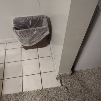 Capri Motel - Dirt around the edge of floor - Hotels Near Me - Fairbury, Nebraska