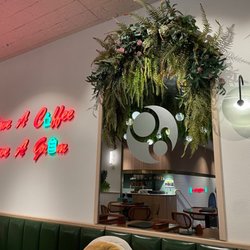Gram Cafe & Pancakes - Wall decor up stairs