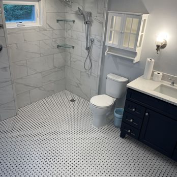 Morris Home Services - Zero entry shower stall just waiting for the glass doors to be installed; fully tiled walls and floor; new toilet and vanity. - Handyman Near Me Morris Home Services - Zero entry shower stall just waiting for the glass doors to be installed; fully tiled walls and floor; new toilet and vanity. - Handyman Near Me