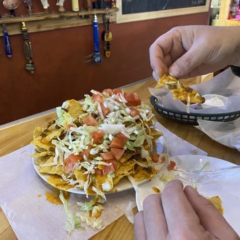 Page One Bar - Large nacho - Bars Near Me - Michigan Center, Michigan Page One Bar - Large nacho - Bars Near Me - Michigan Center, Michigan