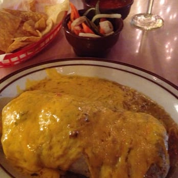 Moreno's - Chile verde burritos.   Too much green sauce inside and outside the burritos.  The burrito wrapper was soaking wet and slimy - Mexican Near Me - Orange, California