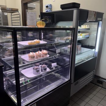 Revival Wines - "Cafe" area where they bake all the delicious desserts. GET THE MINT BROWNIE!!! - Desserts Near Me - Fayetteville, Georgia Revival Wines - "Cafe" area where they bake all the delicious desserts. GET THE MINT BROWNIE!!! - Desserts Near Me - Fayetteville, Georgia