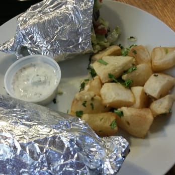 JuJu's Mediterranean Kitchen - Lamb gyro wrap with fried cut up potatoes. - Mediterranean Near Me - Napa, California JuJu's Mediterranean Kitchen - Lamb gyro wrap with fried cut up potatoes. - Mediterranean Near Me - Napa, California