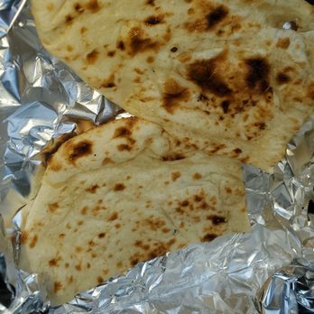 Best Bite Indian Cuisine - Tasty NAAN bread came with 3 Pieces I already ate one before I took the picture fresh and hoT - Indian Near Me - Richmond, British Columbia Best Bite Indian Cuisine - Tasty NAAN bread came with 3 Pieces I already ate one before I took the picture fresh and hoT - Indian Near Me - Richmond, British Columbia