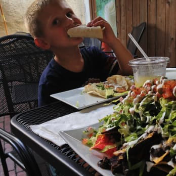 Interstate Drafthouse - My regular black bean nacho selection and my son enjoying salmon tacos - Southern Near Me - Philadelphia, Pennsylvania