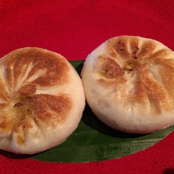 Ron Gastrobar Oriental - Oxtail steamed bun, pan fried. - Asian Fusion Near Me - Amsterdam, New Hampshire Ron Gastrobar Oriental - Oxtail steamed bun, pan fried. - Asian Fusion Near Me - Amsterdam, New Hampshire