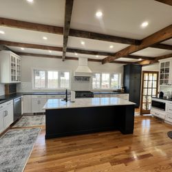 Hannu Contracting - The finished kitchen. Major work included  removal of an interior wall, and removal of a bump out in the exterior wall.