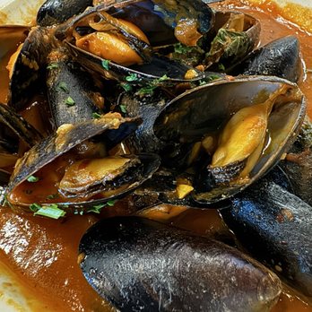 Osteria Bricco - Mussels and Diavolo sauce. Very good and especially good with bread. - Italian Near Me - Seminole, Florida Osteria Bricco - Mussels and Diavolo sauce. Very good and especially good with bread. - Italian Near Me - Seminole, Florida