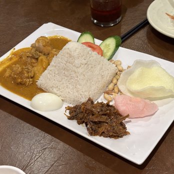 Gourmet Malaysia - Nasi Lemak Coconut Rice (couldn't taste coconut) with Curry Chicken, Egg, Peanuts, Ikan Bilis [dried fish] and Shrimp Chips - Singaporean Near Me - Scarborough, Ontario