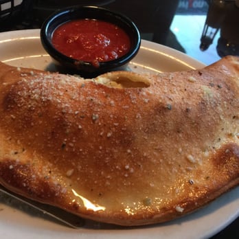 Vinzo's - Calzone was golden and crispy - Pizza Near Me - Casselberry, Florida Vinzo's - Calzone was golden and crispy - Pizza Near Me - Casselberry, Florida