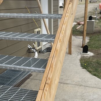 Theory 7 Construction - Untreated wood, 2 boards being screwed together and steps out of code! - General Contractors Near Me