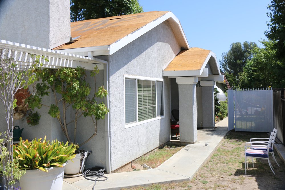 Slide of August Roofing & Solar