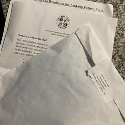 Maryland Motor Vehicle Administration Emissions  - Next step instructions and a set of gloves and a mask