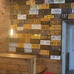 Joe's New York Pizza & Pasta - License plated wall