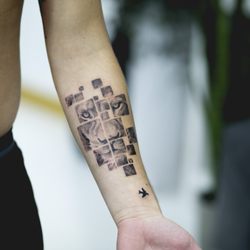 Playhouse Tattoo Studio - Square Geometric Lion Tattoo