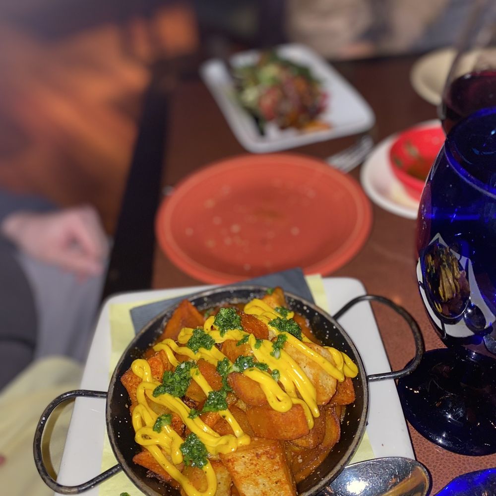 Cascal - Patatas Bravas and octopus in the back - Tapas Bars Near Me - Mountain View, California Cascal - Patatas Bravas and octopus in the back - Tapas Bars Near Me - Mountain View, California