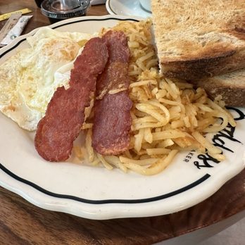 Goddess and the Baker, 44 E Grand - Two egg, turkey bacon, hash browns & sourdough toast breakfast plate is a large portion - Bakeries Near Me - Chicago, Illinois Goddess and the Baker, 44 E Grand - Two egg, turkey bacon, hash browns & sourdough toast breakfast plate is a large portion - Bakeries Near Me - Chicago, Illinois