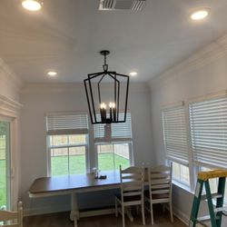 Zacks Plus Electric - Recessed lights installed with medium type chandelier for dining area