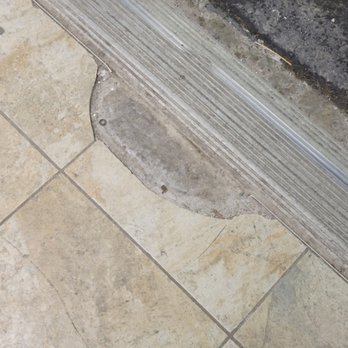Smith Enterprises - Broken tile client wanted our company to patch over with concrete solution until spring. - Handyman Near Me - Dexter, Maine