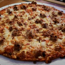 Galloway Tavern - Pizza with sausage, bacon, onion, and tomato. The best thin(ish) crust pizza I've ever had.
