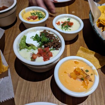 Javelina - Queso sampler (with Bob Armstrong)! From top and clockwise: yellow, white, jalapeno, Bob Armstrong (with white base) - Tex-Mex Near Me - New York, New York Javelina - Queso sampler (with Bob Armstrong)! From top and clockwise: yellow, white, jalapeno, Bob Armstrong (with white base) - Tex-Mex Near Me - New York, New York