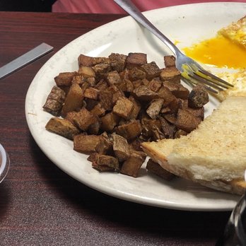 The Farmhouse - a plate of breakfast food on a table - American Near Me - Lubbock, Texas
