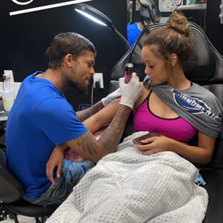 Zoe's Tattoo and Piercings