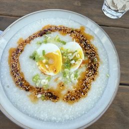 Ginger Rice Congee Warm rice porridge- with chilli sauce and hard boiled egg. Delish!
