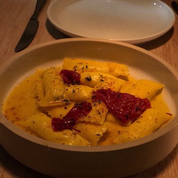 Lilia - Sheeps Milk Cheese Filled Agnolotti, Saffron, Dried Tomato, Honey - Italian Near Me - Brooklyn, New York