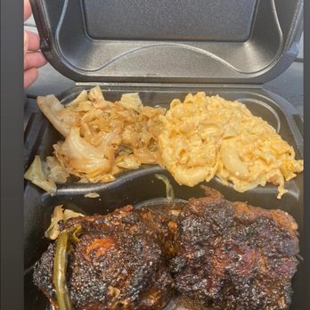 BaQ-Bone BBQ - Smoked oxtail plate with smoked cabbage and jalapeno cheese grits. - Caterers Near Me - Nashville, Tennessee BaQ-Bone BBQ - Smoked oxtail plate with smoked cabbage and jalapeno cheese grits. - Caterers Near Me - Nashville, Tennessee