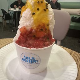 Almond snow with strawberries and passionfruit.