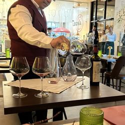 Pane e Vino Ristorante Italiano - Jonathon prepping our wine glasses. Awesome attention to detail!