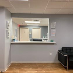 Minimally Invasive Spine Center of South Florida - Our open and welcoming front desk. We don't hide from our patients.