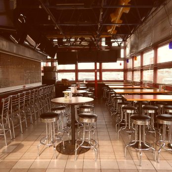Gatsby's Pizza & Pub - There's an additon on the building (lots of windows with red trim) that would be perfect for a private party. - Pizza Near Me - Arlington Heights, Illinois