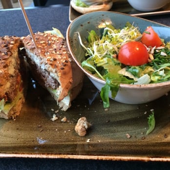 Hans Im Glück - Gorgonzola burger on whole grain bun with side salad. - Burgers Near Me - Munich, BY Hans Im Glück - Gorgonzola burger on whole grain bun with side salad. - Burgers Near Me - Munich, BY