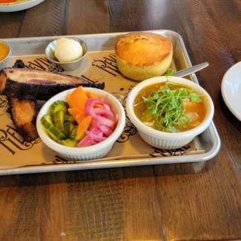 Revival - Pork Belly meat plate with beans and a side of pickles - Southern Near Me - Minneapolis, Minnesota Revival - Pork Belly meat plate with beans and a side of pickles - Southern Near Me - Minneapolis, Minnesota