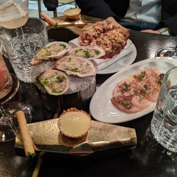 Alo Restaurant - Oysters, wagyu beef tartare, hamachi sashimi, egg and cavier tart, smoked cheese cigar - Bars Near Me - Toronto, Ontario Alo Restaurant - Oysters, wagyu beef tartare, hamachi sashimi, egg and cavier tart, smoked cheese cigar - Bars Near Me - Toronto, Ontario