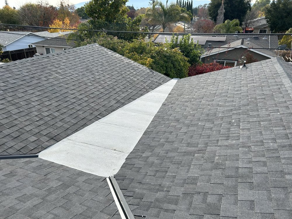 Slide of Tip Top Roofing