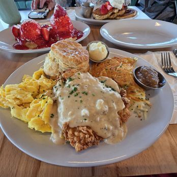 Union Biscuit - Chicken fried chicken with sausage gravy, scrambled eggs, a biscuit with honey butter and apple butter, and hash browns - Breakfast & Brunch Near Me - Las Vegas, Nevada Union Biscuit - Chicken fried chicken with sausage gravy, scrambled eggs, a biscuit with honey butter and apple butter, and hash browns - Breakfast & Brunch Near Me - Las Vegas, Nevada