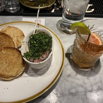 Opal's Table - Beef tartar and some sort of tequila drink with Tajin. Really good drink! - New American Near Me - Midland, Texas